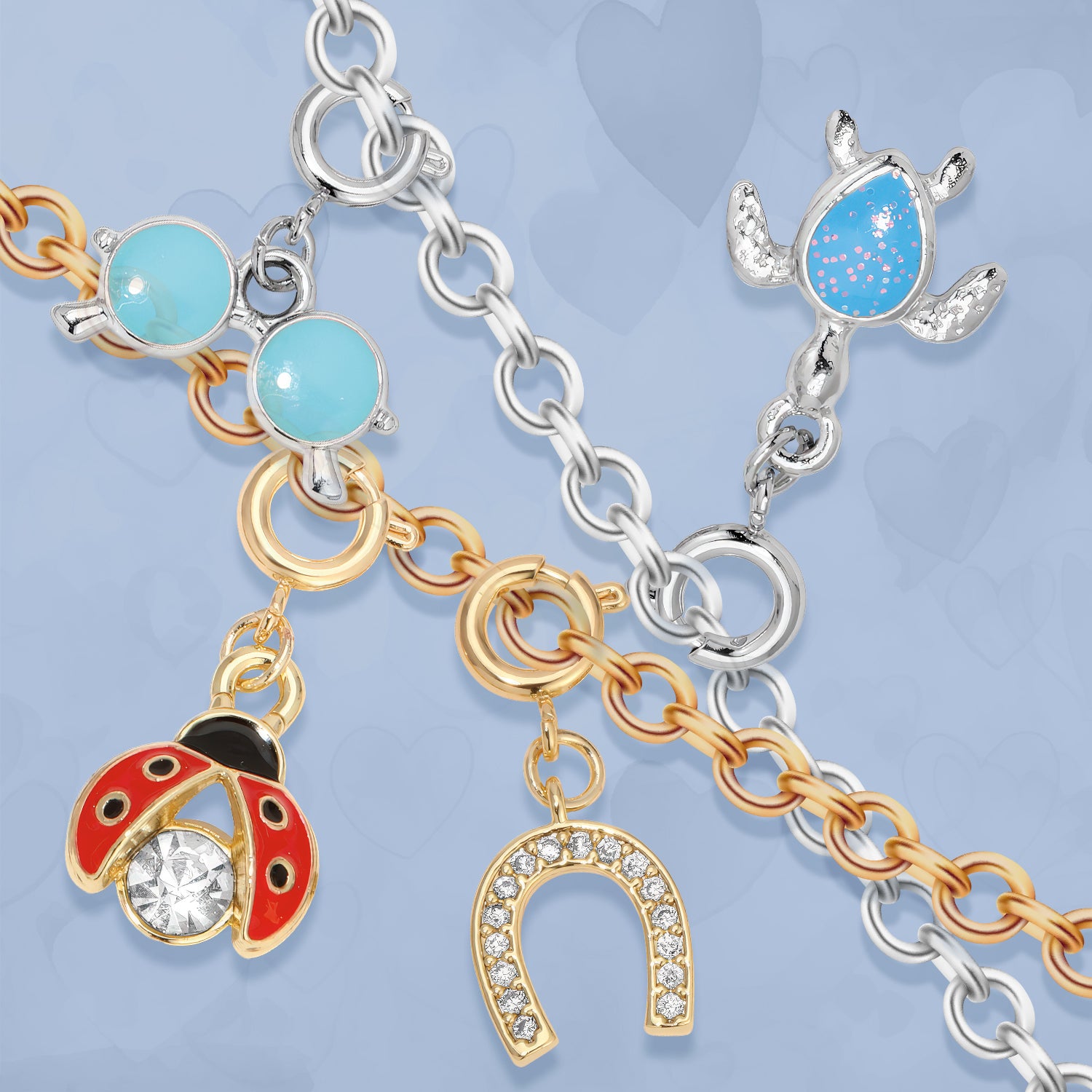 gold and silver bracelets with charms