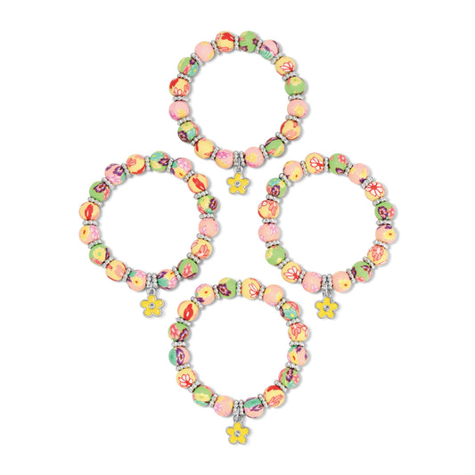 four colorful beaded bracelets with floral charms