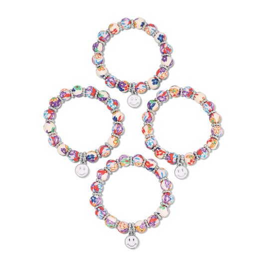 four colorful beaded bracelets with smiley charms