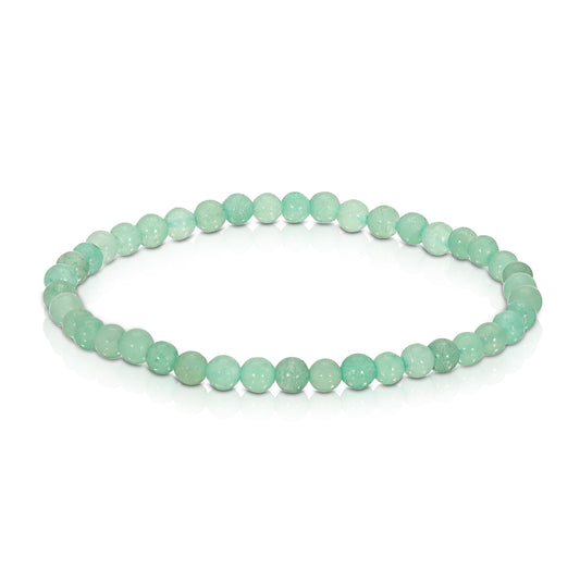green beaded bracelet on white background