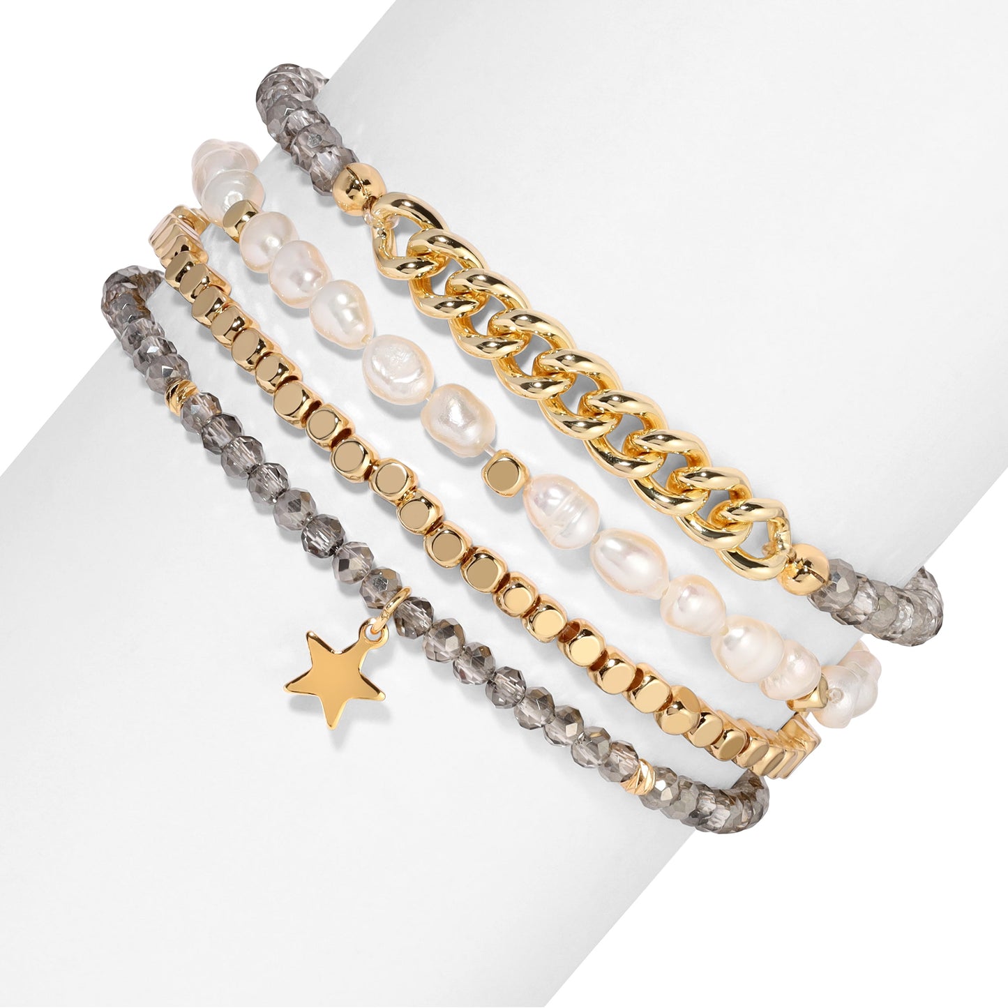 stacked gold and pearl beaded bracelets with star charm