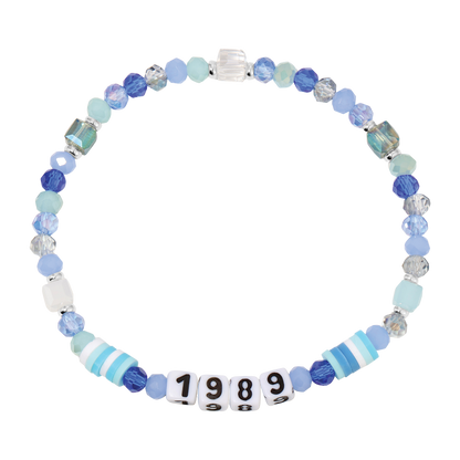 Beaded bracelet with '1989' beads on a white background