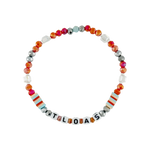 Colorful beaded bracelet with letter beads spelling 'TLOAS' on a white background