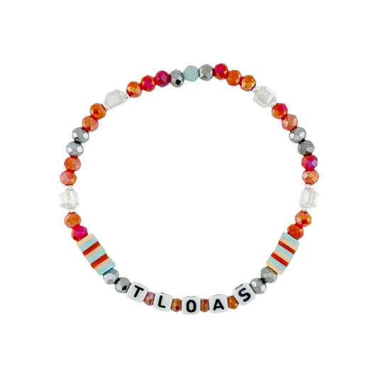 Colorful beaded bracelet with letter beads spelling 'TLOAS' on a white background