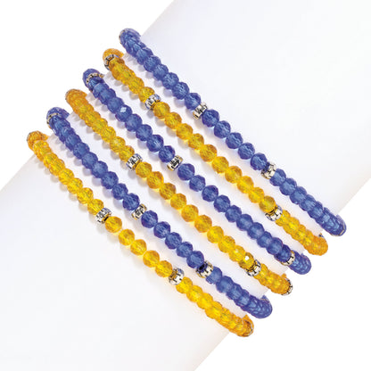 colorful beaded bracelets on white background