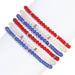 colorful beaded bracelets on white background