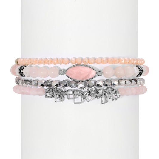 bracelet stack with pink beads and gemstone